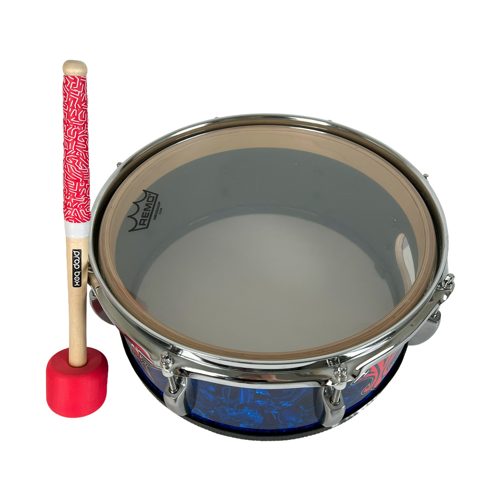 Mascot drum mallet shown with professional marching snare