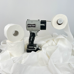 Side view of mascot toilet paper blower prop sitting on extra rolls