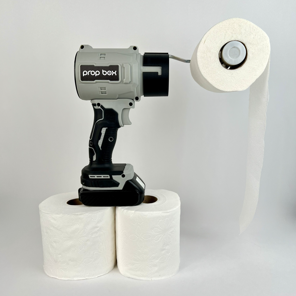 Profile view of PropBox mascot blower prop with toilet paper roll loaded